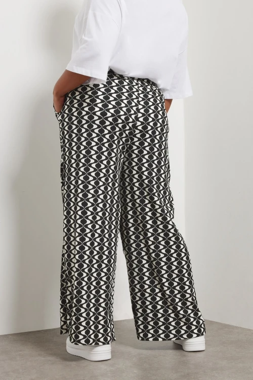 Büyük Beden Beli Lastikli Cepli Dsenli Bol Paça Pantolon 303970