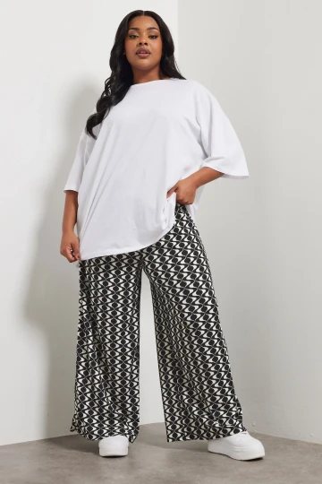 Büyük Beden Beli Lastikli Cepli Dsenli Bol Paça Pantolon 303970